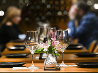 KRAKOW, POLAND - NOVEMBER 21:   
Empty tables waiting for tourists inside a nearly empty restaurant in Krakow's Main Square, on November 21,...