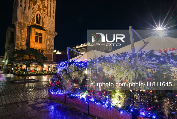 KRAKOW, POLAND - NOVEMBER 21:   
General view of outdoor seating at restaurants in Krakow's Main Market Square, decorated for the Christmas...