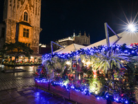 KRAKOW, POLAND - NOVEMBER 21:   
General view of outdoor seating at restaurants in Krakow's Main Market Square, decorated for the Christmas...