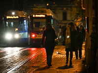 KRAKOW, POLAND - NOVEMBER 21:   
A winter evening view of crossing tramways near Krakow's Old Town, illuminated by streetlights, on November...