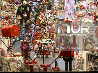 KRAKOW, POLAND - NOVEMBER 21:   
A shop window displaying Christmas-themed objects and decorations, on November 21, 2024 in Krakow, Poland....