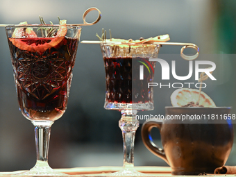 KRAKOW, POLAND - NOVEMBER 21:   
Glasses of Grzaniec (hot wine) on display at a local shop/bar in Krakow's Old Town, on November 21, 2024 in...