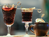 KRAKOW, POLAND - NOVEMBER 21:   
Glasses of Grzaniec (hot wine) on display at a local shop/bar in Krakow's Old Town, on November 21, 2024 in...