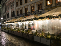 KRAKOW, POLAND - NOVEMBER 21:   
General view of outdoor seating at restaurants in Krakow's Main Market Square, decorated for the Christmas...