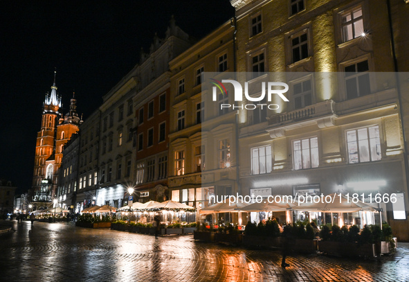 KRAKOW, POLAND - NOVEMBER 21:   
General view of outdoor seating at restaurants in Krakow's Main Market Square, decorated for the Christmas...