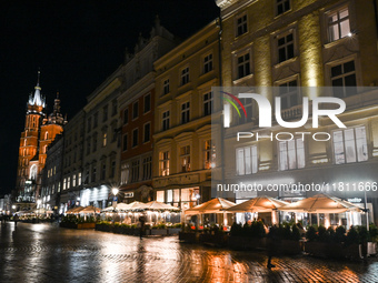 KRAKOW, POLAND - NOVEMBER 21:   
General view of outdoor seating at restaurants in Krakow's Main Market Square, decorated for the Christmas...