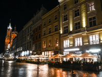 KRAKOW, POLAND - NOVEMBER 21:   
General view of outdoor seating at restaurants in Krakow's Main Market Square, decorated for the Christmas...