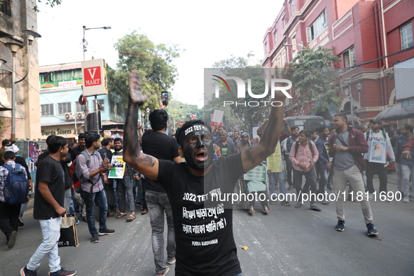 Job seekers and teachers shout slogans demanding the requirement for fifty thousand vacant posts as they take part in a protest march in Kol...