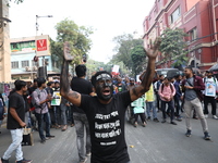 Job seekers and teachers shout slogans demanding the requirement for fifty thousand vacant posts as they take part in a protest march in Kol...