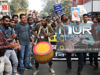 Job seekers and teachers shout slogans demanding the requirement for fifty thousand vacant posts as they take part in a protest march in Kol...