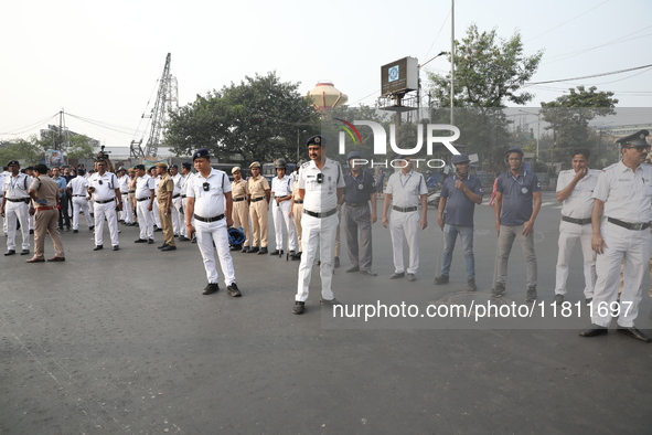 Job seekers and teachers shout slogans demanding the requirement for fifty thousand vacant posts as they take part in a protest march in Kol...