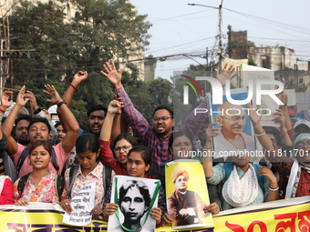 Job seekers and teachers shout slogans demanding the requirement for fifty thousand vacant posts as they take part in a protest march in Kol...