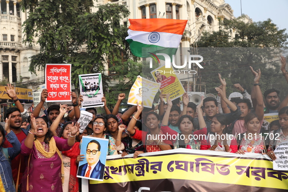 Job seekers and teachers shout slogans demanding the requirement for fifty thousand vacant posts as they take part in a protest march in Kol...