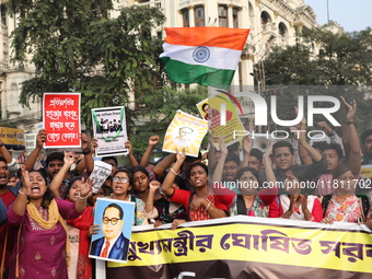 Job seekers and teachers shout slogans demanding the requirement for fifty thousand vacant posts as they take part in a protest march in Kol...