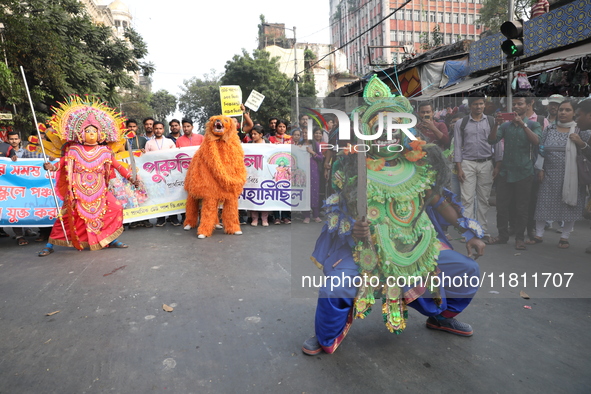 Job seekers and teachers shout slogans demanding the requirement for fifty thousand vacant posts as they take part in a protest march in Kol...