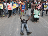 An unemployed primary teacher takes out a rally in Kolkata, India, on November 26, 2024, and blocks the arterial Dorina crossing in the hear...