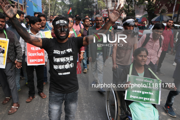 An unemployed primary teacher takes out a rally in Kolkata, India, on November 26, 2024, and blocks the arterial Dorina crossing in the hear...