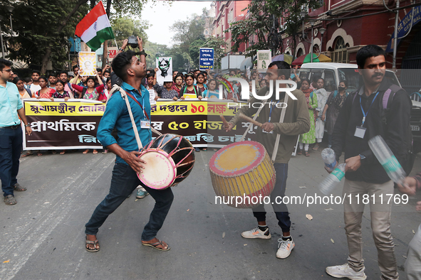 An unemployed primary teacher takes out a rally in Kolkata, India, on November 26, 2024, and blocks the arterial Dorina crossing in the hear...