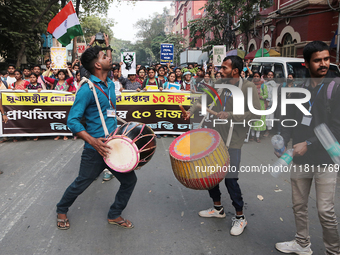 An unemployed primary teacher takes out a rally in Kolkata, India, on November 26, 2024, and blocks the arterial Dorina crossing in the hear...