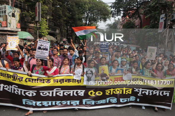 An unemployed primary teacher takes out a rally in Kolkata, India, on November 26, 2024, and blocks the arterial Dorina crossing in the hear...