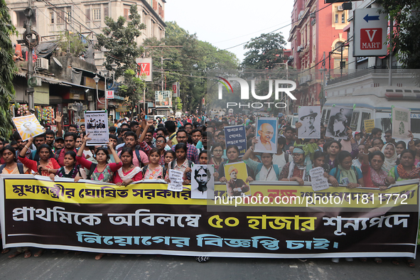 An unemployed primary teacher takes out a rally in Kolkata, India, on November 26, 2024, and blocks the arterial Dorina crossing in the hear...