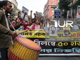 An unemployed primary teacher takes out a rally in Kolkata, India, on November 26, 2024, and blocks the arterial Dorina crossing in the hear...