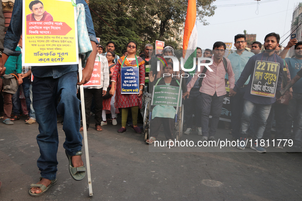 An unemployed primary teacher takes out a rally in Kolkata, India, on November 26, 2024, and blocks the arterial Dorina crossing in the hear...