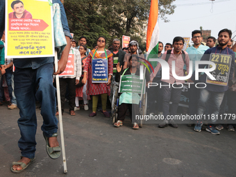 An unemployed primary teacher takes out a rally in Kolkata, India, on November 26, 2024, and blocks the arterial Dorina crossing in the hear...