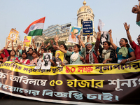 An unemployed primary teacher takes out a rally in Kolkata, India, on November 26, 2024, and blocks the arterial Dorina crossing in the hear...