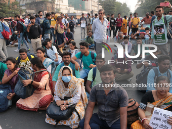 An unemployed primary teacher takes out a rally in Kolkata, India, on November 26, 2024, and blocks the arterial Dorina crossing in the hear...