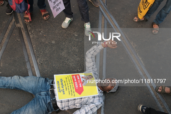 An unemployed primary teacher takes out a rally in Kolkata, India, on November 26, 2024, and blocks the arterial Dorina crossing in the hear...