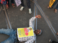 An unemployed primary teacher takes out a rally in Kolkata, India, on November 26, 2024, and blocks the arterial Dorina crossing in the hear...