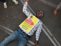 An unemployed primary teacher takes out a rally in Kolkata, India, on November 26, 2024, and blocks the arterial Dorina crossing in the hear...