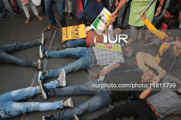 An unemployed primary teacher takes out a rally in Kolkata, India, on November 26, 2024, and blocks the arterial Dorina crossing in the hear...