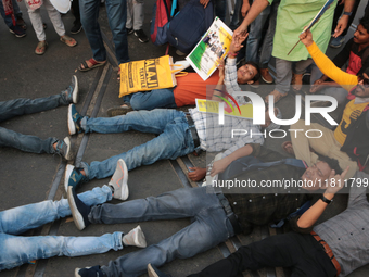 An unemployed primary teacher takes out a rally in Kolkata, India, on November 26, 2024, and blocks the arterial Dorina crossing in the hear...