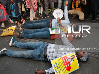 An unemployed primary teacher takes out a rally in Kolkata, India, on November 26, 2024, and blocks the arterial Dorina crossing in the hear...