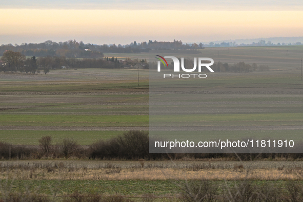 KRAKOW, POLAND - NOVEMBER 19:   
A typical November landscape with grey frozen fields and leafless trees, seen from a Krakow-Warsaw train wi...