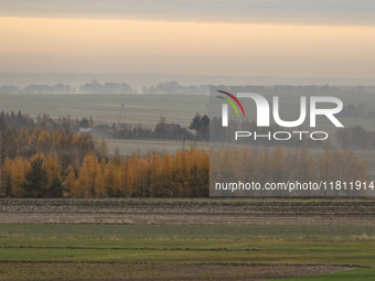 KRAKOW, POLAND - NOVEMBER 19:   
A typical November landscape with grey frozen fields and leafless trees, seen from a Krakow-Warsaw train wi...