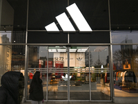 WARSAW, POLAND - NOVEMBER 19:   
The Adidas logo displayed on a store facade, on November 19, 2024 in Warsaw, Poland. (