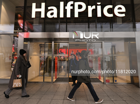 WARSAW, POLAND - NOVEMBER 19:   
The 'Half Price' logo displayed at the entrance to a retail store, on November 19, 2024 in Warsaw, Poland. 