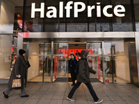 WARSAW, POLAND - NOVEMBER 19:   
The 'Half Price' logo displayed at the entrance to a retail store, on November 19, 2024 in Warsaw, Poland....