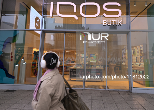 WARSAW, POLAND - NOVEMBER 19:   
The IQOS Butik logo displayed at the entrance to a retail store, on November 19, 2024 in Warsaw, Poland. 