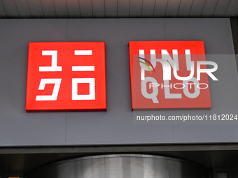 WARSAW, POLAND - NOVEMBER 19:   
The UNIQLO logo displayed at the entrance to a retail store, on November 19, 2024 in Warsaw, Poland. (