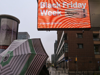 WARSAW, POLAND - NOVEMBER 19:   
A 'Black Friday' ad displayed on a screen outside a retail store, promoting seasonal discounts, on November...