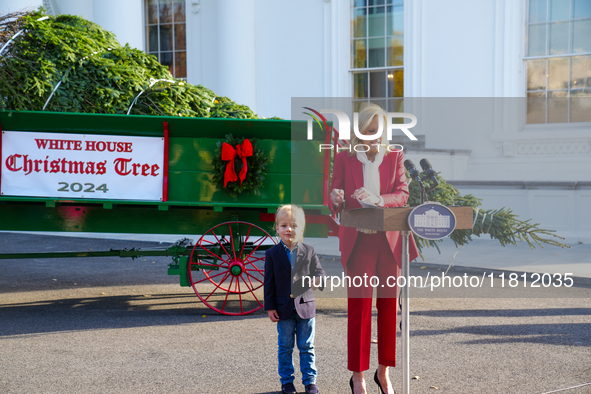 Presidential grandson Beau Biden joins the First Lady at the arrival of the White House Christmas Tree. The tree from North Carolina is deli...