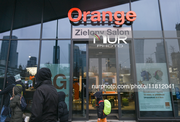 WARSAW, POLAND - NOVEMBER 19:   
The Orange logo displayed at the entrance to a retail store, on November 19, 2024 in Warsaw, Poland. 