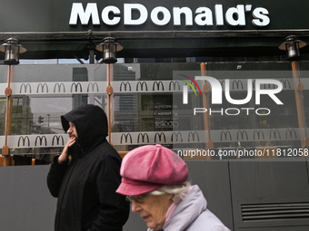 WARSAW, POLAND - NOVEMBER 19:   
The McDonald's logo displayed at the entrance to a fast-food restaurant, on November 19, 2024 in Warsaw, Po...