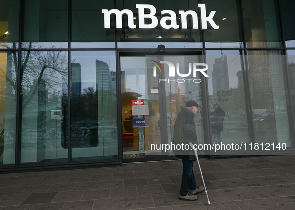 WARSAW, POLAND - NOVEMBER 19:   
The mBank logo displayed at the entrance to a bank office, on November 19, 2024 in Warsaw, Poland. 