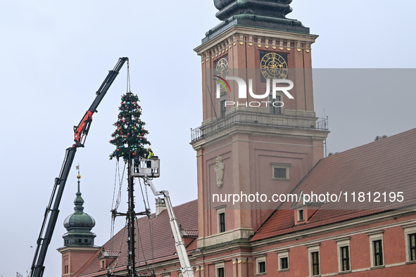 WARSAW, POLAND - NOVEMBER 19:   
Christmas tree and decorations being set up in front of the Royal Castle in Warsaw, preparing for the holid...