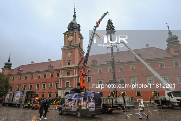 WARSAW, POLAND - NOVEMBER 19:   
Christmas tree and decorations being set up in front of the Royal Castle in Warsaw, preparing for the holid...